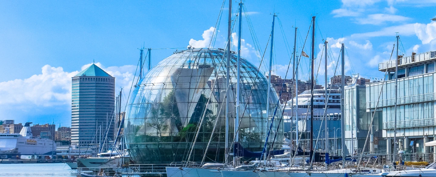 Photo Walk in Genoa exploring Porto Antico’s iconic architecture, as a day trip from Milan.