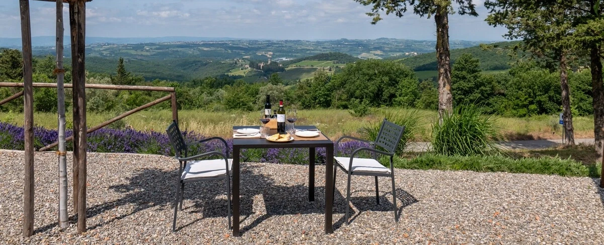 Hiking Tour in Chianti from Florence through abbey paths and vineyards in the Tuscan rolling hills.