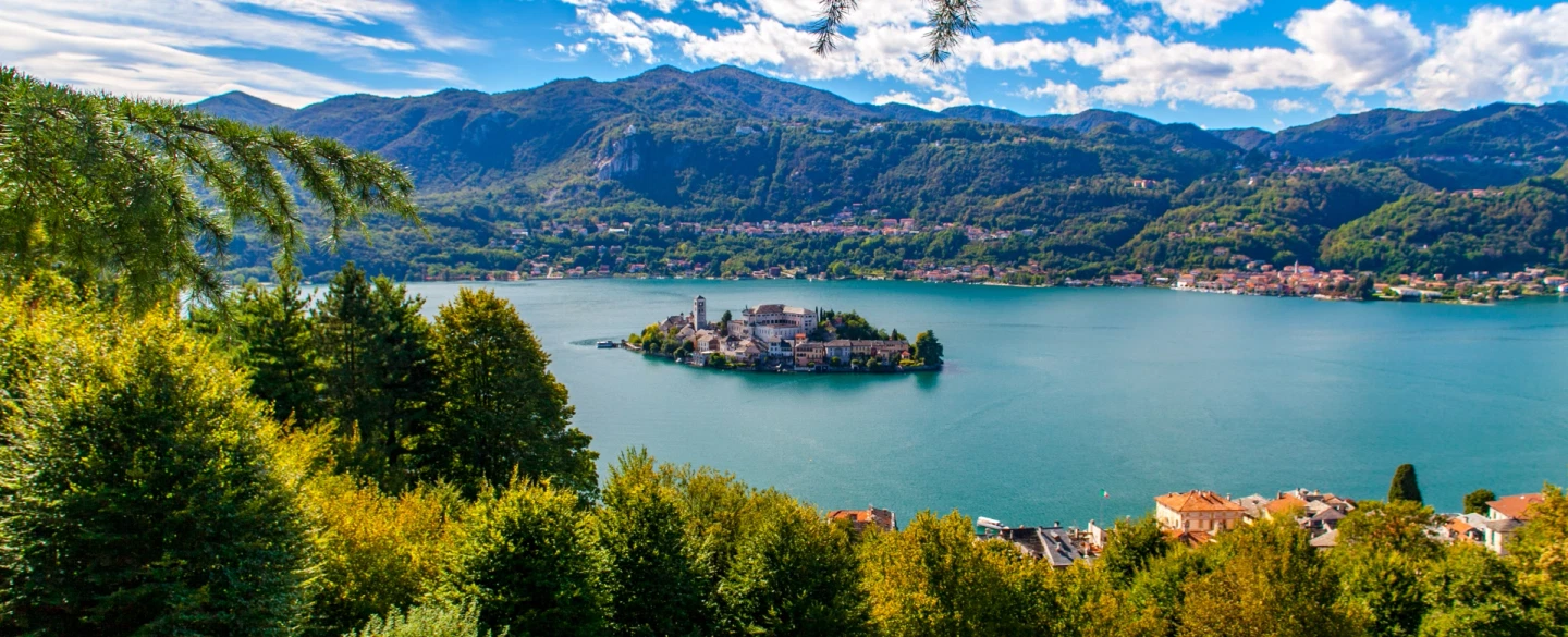 Day Trip from Milan to Lake Orta exploring scenic hills, sacred sites and sweeping lake views.