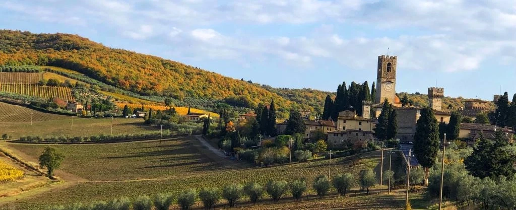 Hiking Tour in Chianti from Florence through abbey paths and vineyards in the Tuscan rolling hills.